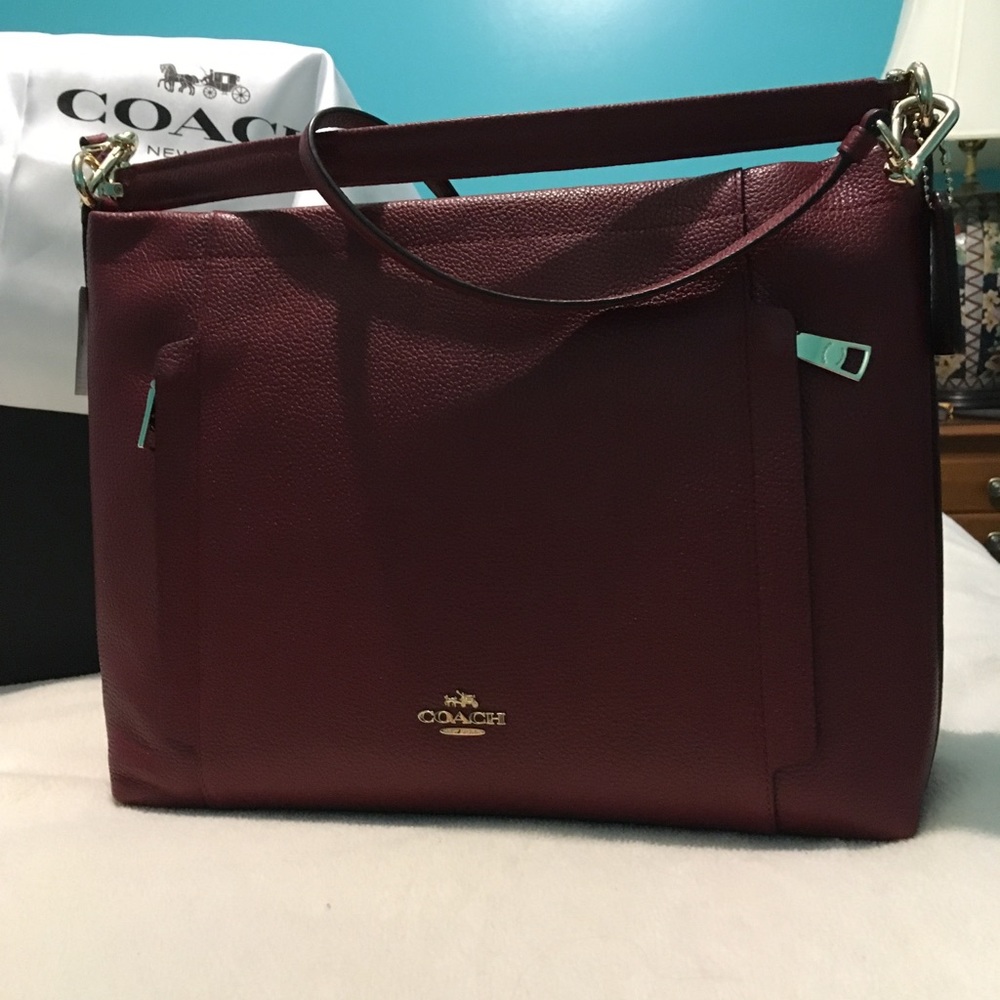 Red pebble Coach bag